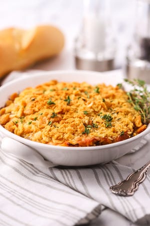 Sweet Onion Casserole features caramelized Vidalia onions paired with sour cream and two types of cheese and topped with Ritz cracker crumbs.