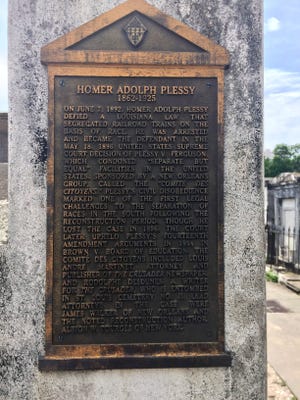 This June 3, 2018 photo shows a marker on Homer Plessy's burial ground at St.  Louis Number 1 in New Orleans.  Plessy, the name of the judgment 