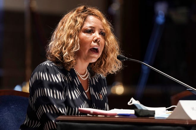 In this Wednesday, June 17, 2020, photo, Rep. Lucy Kay McBath, D-Ga., speaks on Capitol Hill in Washington. An initial proposal to redraw Georgia's congressional districts appears to give Republicans a better chance of winning a suburban Atlanta congressional district now held by McBath.