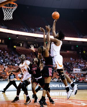 Texas forward DeYona Gaston (5) puts the ball up over the Southeast Missouri defense during the second half of the Longhorn’s game against the Redhawks on Wednesday, Nov. 17, 2021 at the Erwin Center. The Longhorns won the game 88-47. 