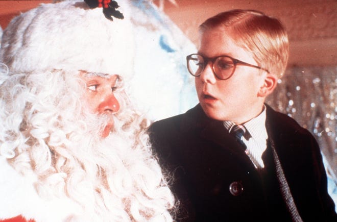 In "A Christmas Story," Ralphie (Peter Billingsley) tells Santa his wish for “an official Red Ryder, carbine action, 200-shot, range model air rifle, with a compass in the stock and this thing that tells time.”