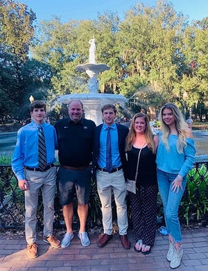 Barry Kleinpeter, center, with his father, Barry Sr., his mother Jennifer, his sister Katie and his brother Brooks in a family photo taken in Forsyth Park.