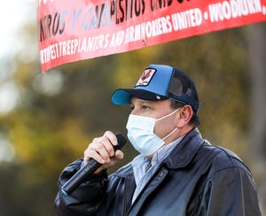 Farmworker Manuel Nieves speaks at a PCUN rally to kick off its campaign for farmworker overtime on Tuesday, Nov. 16, 2021 at the Oregon State Capitol in Salem, Ore.