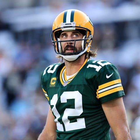 Aaron Rodgers #12 of the Green Bay Packers reacts 