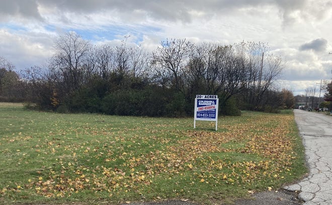 The for-sale sign on property along Wilkins Road owned by the Erie Regional Airport Authority is shown in November 2021. The property is now the subject of a lawsuit.