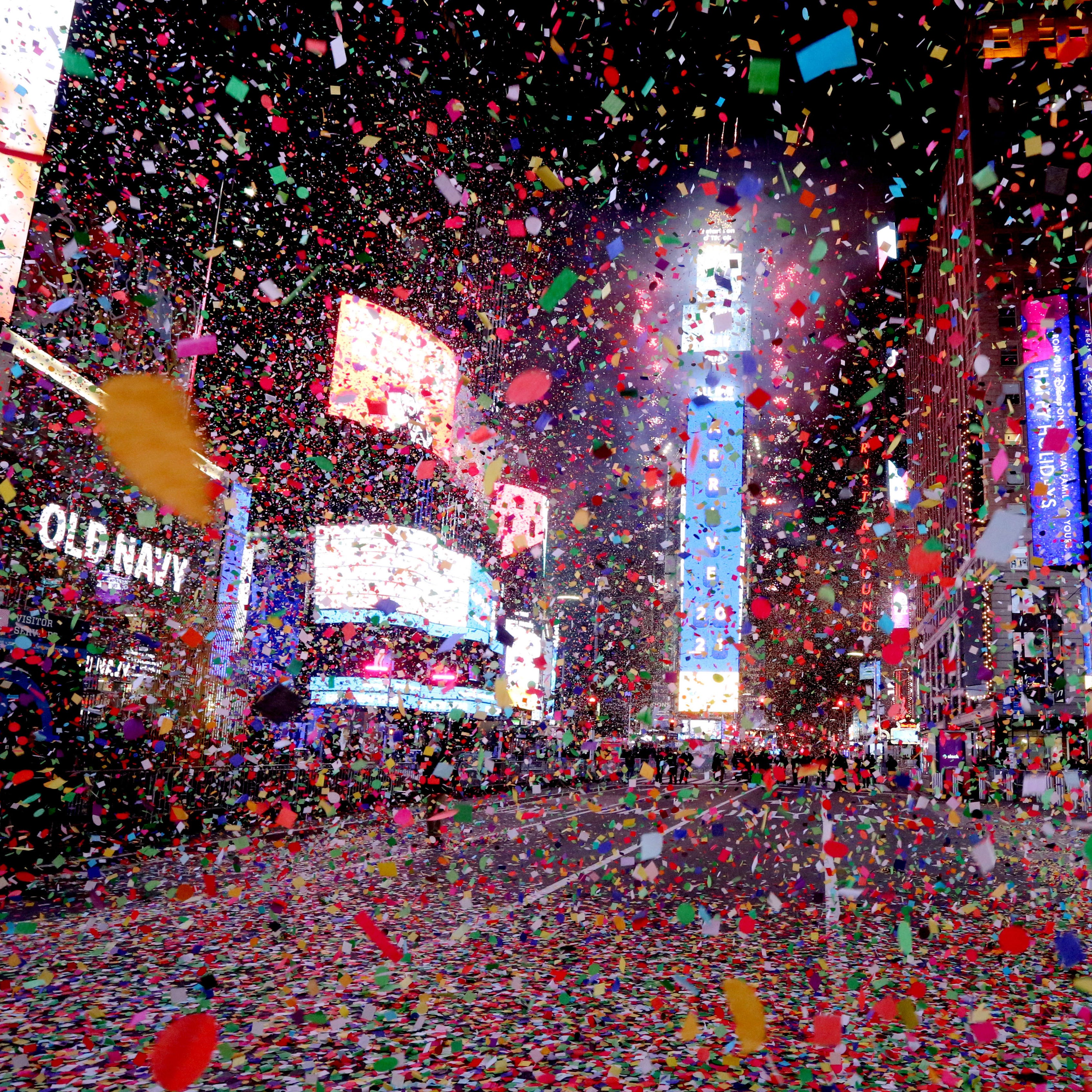 Confetti rains down on an empty Times Square in Manhattan after the ball dropped Jan. 1, marking the start of 2021. Times Square, usually packed with thousands, was closed to all but a few because of COVID-19 restrictions.
