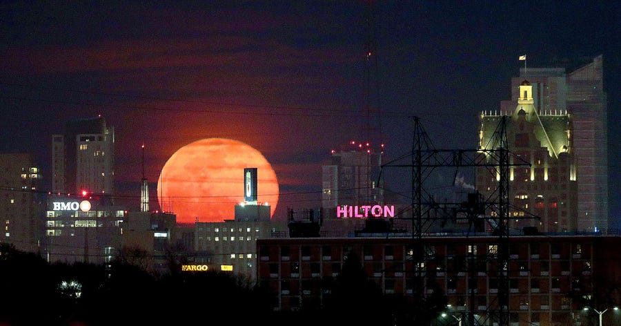 February 27, 2021: A full moon rises over Milwaukee. The full moon is also referred to as the snow moon due to the snow cover on the ground at this time of year.