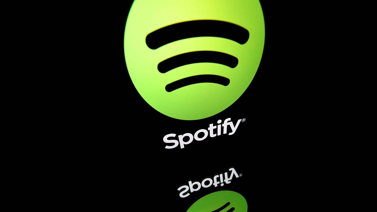 This file illustration taken on April 19, 2018 shows the logo of online streaming music service Spotify displayed on a tablet screen in Paris.