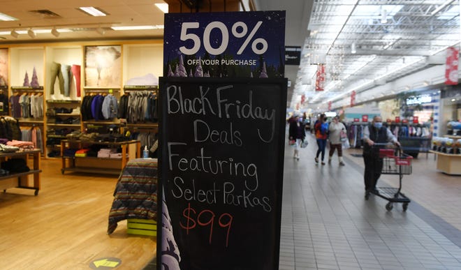 Black Friday deals  sign displays at North Grand Mall in Ames, Iowa. The picture takenon Friday, Nov. 19, 2021.