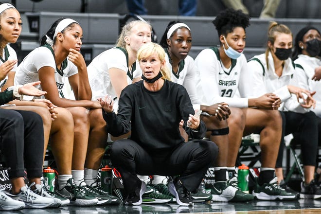 Michigan State's head coach Suzy Merchant talks with the team on the bench during the second quarter in the game against Bryant on Friday, Nov. 19, 2021, at the Breslin Center in East Lansing.