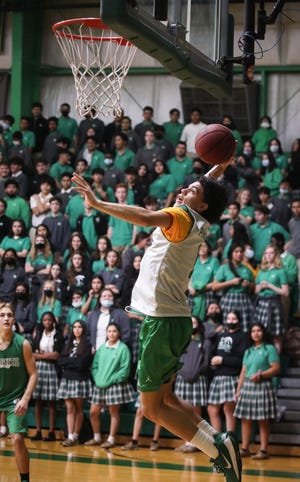 Styles Phipps takes a shot during the Green/White game, November 19, 2021, at St. Mary's High School, Phoenix, Arizona.