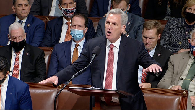 In this image from House Television, House Minority Leader Kevin McCarthy of Calif., speaks on the House floor during debate on the Democrats' expansive social and environment bill at the U.S. Capitol on Thursday, Nov. 18, 2021, in Washington. (House Television via AP) ORG XMIT: WX302