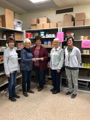 The Little Giants Care Closet and Food Pantry was the recent recipient of a donation from the Spoon River Garden Club from proceeds of the annual Spring plant sale. Participating in the presentation were, pictured from the left: Becky Eyman, Club Treasurer, Janice Reneau, President, Stacy Murphy pantry co-coordinator, Janice Brewster, Club member and Kelsey Emberton pantry co-coordinator.