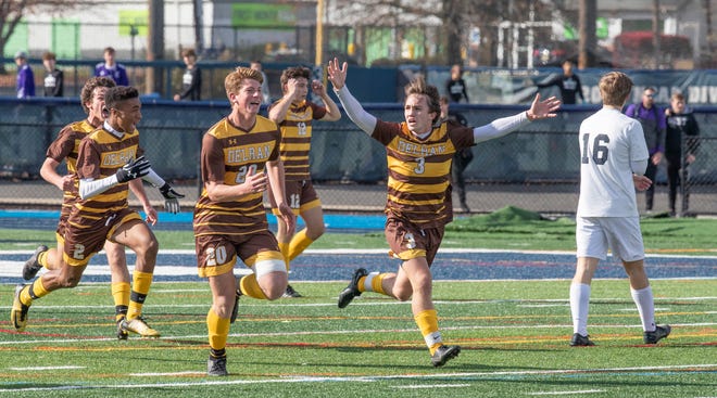 Delran Landon Urwiler leads the charge down the field as they celebrate their state final win. Delran Boys Soccer defeats Ramsey 2-1 in NJSIAA Group II final in Union,  NJ on November 20, 2021.