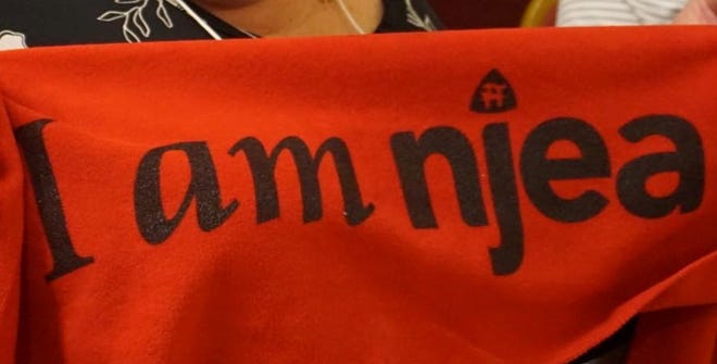 'I am NJEA' scarf.