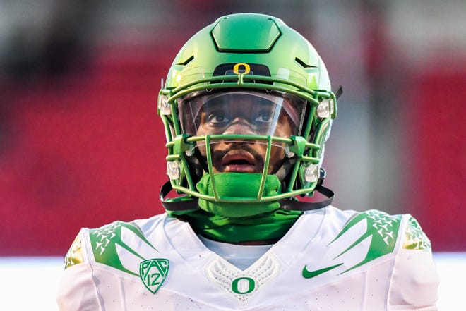Oregon quarterback Anthony Brown looks on during warmups for Saturday's game against Utah in Salt Lake City.