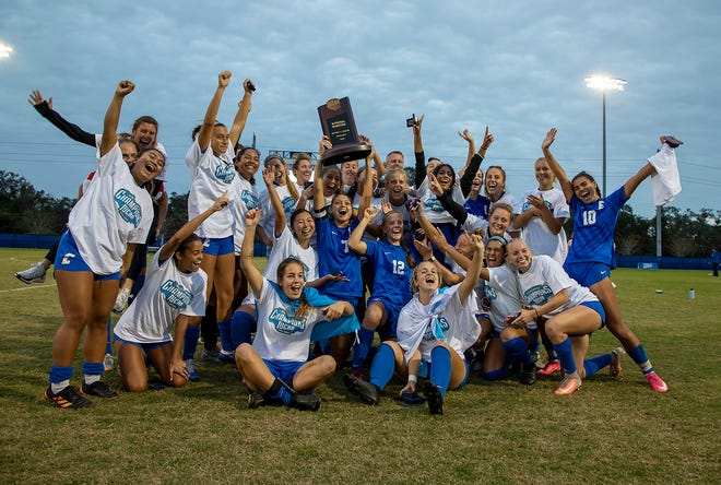 The Eastern Florida State College women’s soccer team celebrates winning the NJCAA Division I National Championship title Saturday at Daytona State College after defeating Tyler Junior College 1-0.