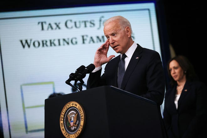 U.S. President Joe Biden delivers remarks with Vice President Kamala Harris on the day tens of millions of parents will get their first monthly Child Tax Credit relief payments in the South Court Auditorium in the Eisenhower Executive Office Building on July 15, 2021, in Washington, D.C. (Chip Somodevilla/Getty Images/TNS)