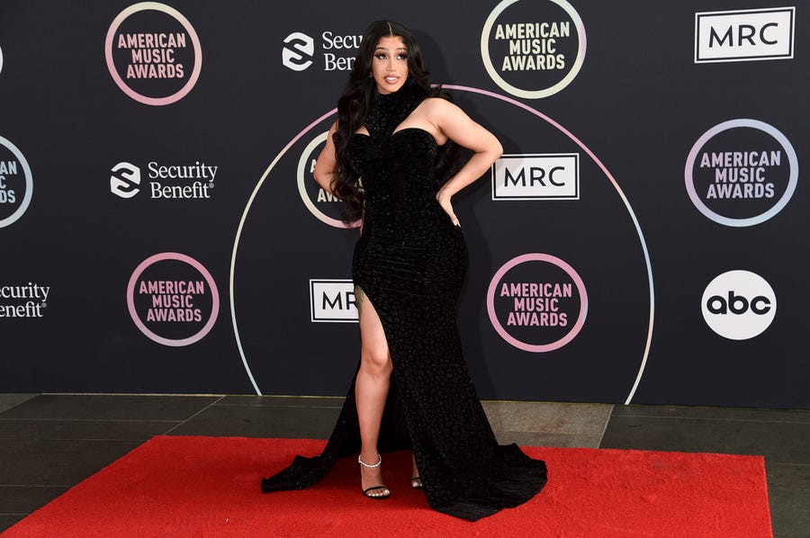 Cardi B poses for photos after the ceremonial red carpet roll out at the 2021 American Music Awards on Friday, Nov. 19, 2021, in Los Angeles.