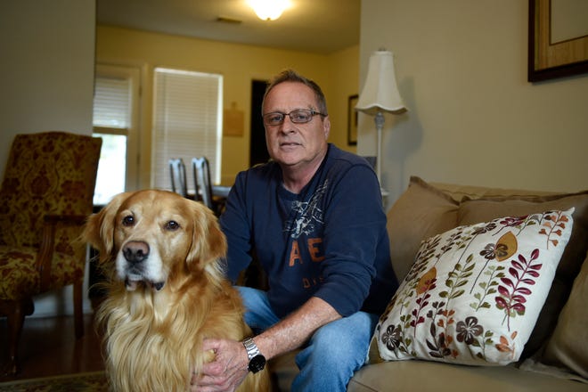 Derrill Deal, of Martinez, pictured with his dog Bear at home, shared his journey through alcoholism to recovery, saying he is thankful for a second chance.