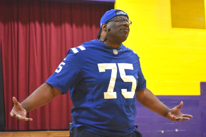 Retired NFL football player Shawn Harper is introduced to the Onsted Middle School student body and staff during aan assembly Friday in the middle school gymnasium. Harper challenged both students and staff to face adverse situations head on, to make the right choices in life and to never waver from following their dreams.