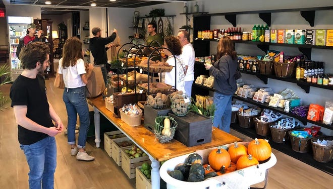 Locals check out the new Agoria Market in Petersburg.