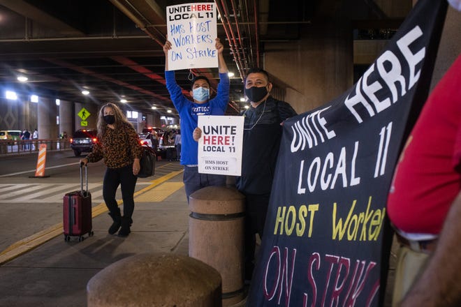HMSHost workers protest outside Terminal 4, on Nov. 22, 2021, at Phoenix Sky Harbor International Airport.