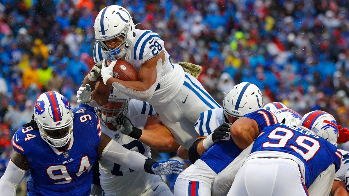 Colts RB Jonathan Taylor scores one of his five TDs at Buffalo on Sunday.