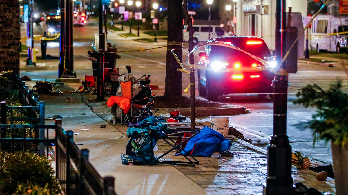 November 21, 2021; Waukesha, WI, USA; Abandoned chairs, blankets and other items remain along W. Main St. in downtown Waukesha after a vehicle plowed through the Christmas Parade, leaving multiple people injured on Sunday, Nov. 21, 2021. Mandatory Credit: Scott Ash-USA TODAY NETWORK
