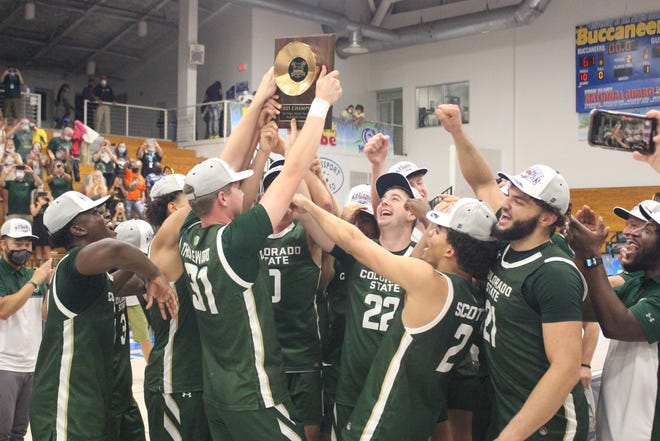 The CSU basketball team celebrates a 71-61 win over Northeastern in the Paradise Jam championship game at the University of the Virgin Islands on Monday, Nov. 22, 2021.