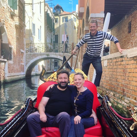Taking a gondola ride through Venice's many canals