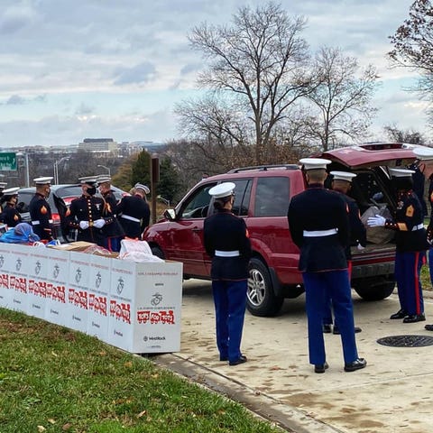 U.S. Marines collect donated goods as part of Toys