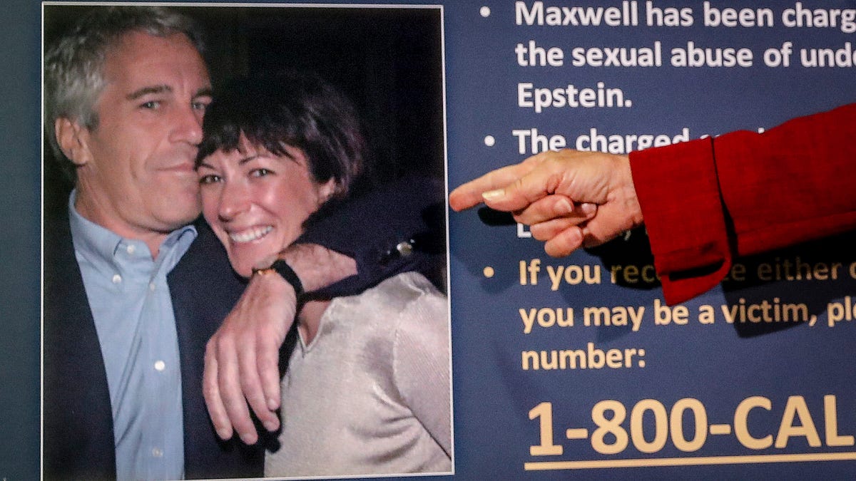 Audrey Strauss, acting U.S. attorney for the Southern District of New York, points  to a photo of Jeffrey Epstein and Ghislaine Maxwell during a news conference in New York on July 2, 2020.