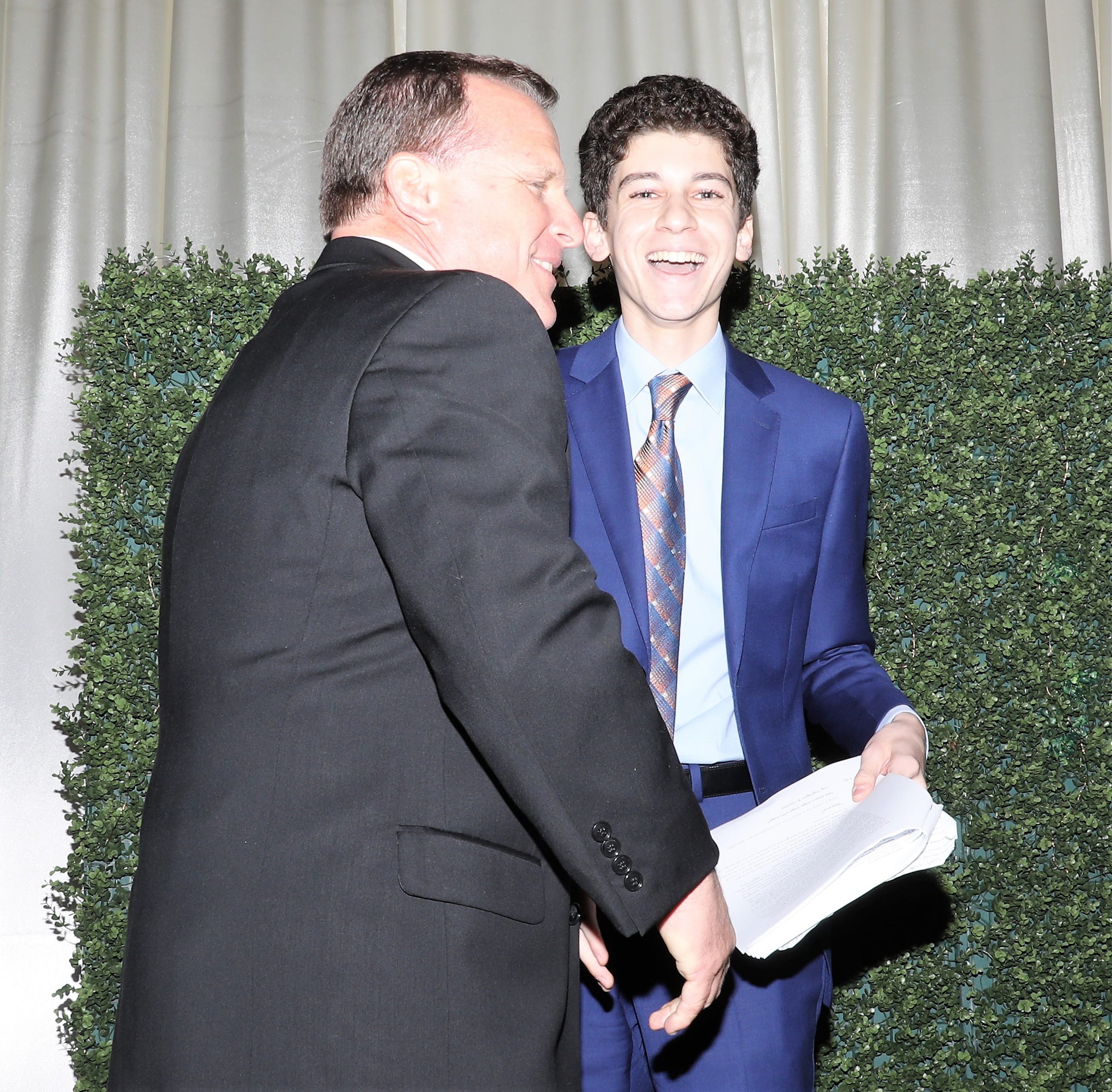 President/CEO of Boys and Girls Clubs of Sarasota and DeSoto Counties Bill Sadlo greets Jorge Hernandez-Perez, Youth of the Year and also tonight's emcee.  Boys & Girls Clubs of Sarasota and DeSoto Counties held their Champions for Children Gala on November 20, 2021. Over 400 people came out to celebrate longtime supporters and donors Steven and Marjolaine Townsend who also have a scholarship fund in their name that has benefitted thirty-two college students since its inception in 2018.
JANET COMBS/HERALD-TRIBUNE
