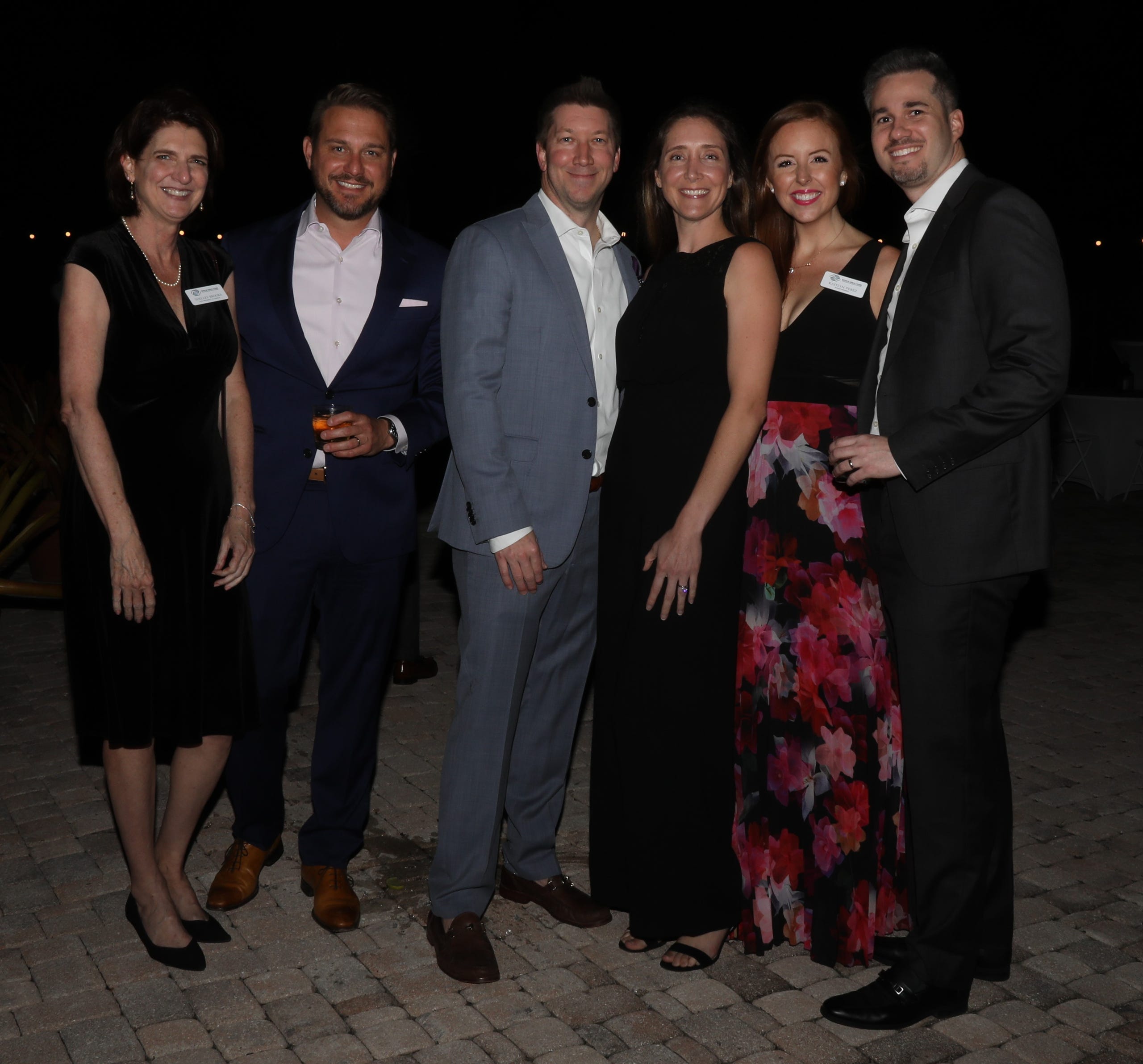 Guests mingled in the outdoor pool area as they enjoyed hors d'oeuvres and drinks during the cocktail hour. The Boys & Girls Clubs of Sarasota and DeSoto Counties held their Champions for Children Gala on November 20, 2021. Over 400 people came out to celebrate longtime supporters and donors Steven and Marjolaine Townsend who also have a scholarship fund in their name that has benefitted thirty-two college students since its inception in 2018. JANET COMBS/HERALD-TRIBUNE
