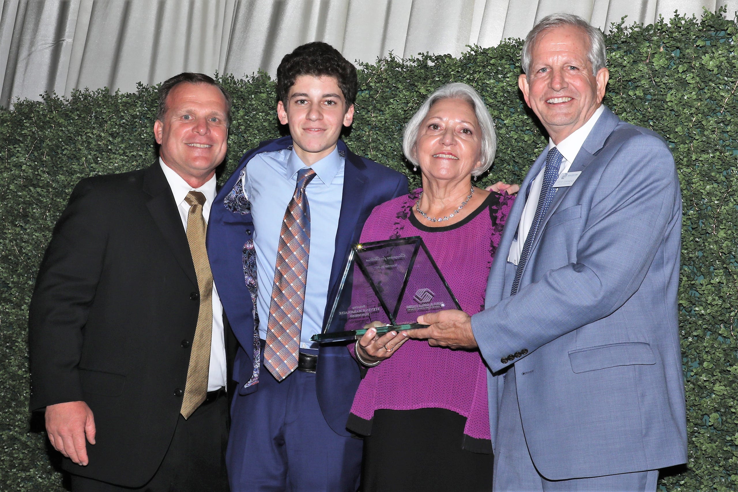 Board President/CEO Bill Sadlo (L), Youth of the Year and Emcee Jorge Hernandez-Perez, Marjolaine and Steven Townsend. Boys & Girls Clubs of Sarasota and DeSoto Counties held their Champions for Children Gala on November 20, 2021. Over 400 people came out to celebrate longtime supporters and donors Steven and Marjolaine Townsend who also have a scholarship fund in their name that has benefitted thirty-two college students since its inception in 2018. JANET COMBS/HERALD-TRIBUNE