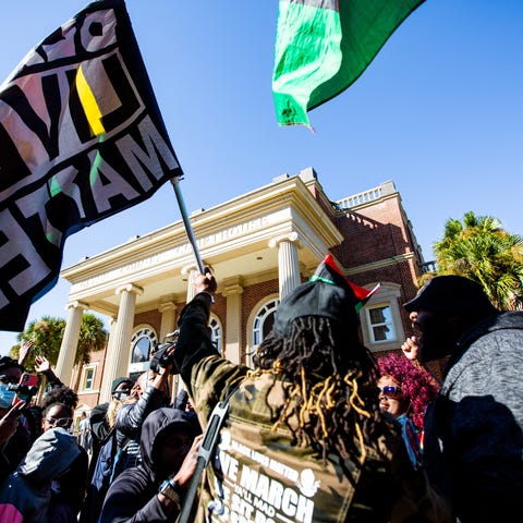 Supporters gather outside the Glynn County Courtho