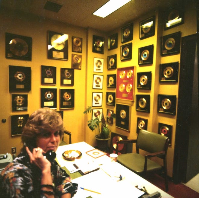 Rosalie Trombley in her gold record-filled office at CKLW in the mid-1970s.