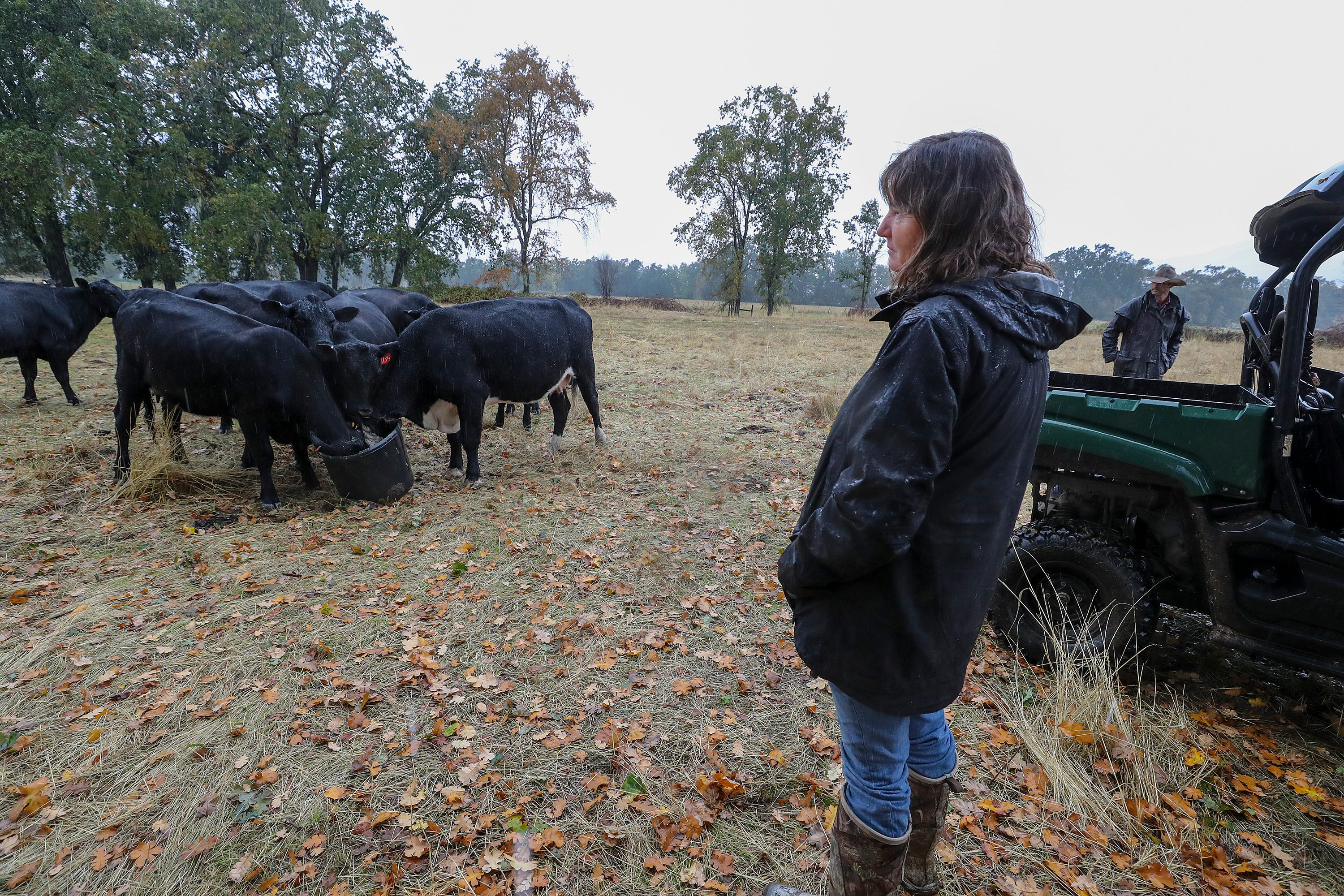 Katie Delbar keeps an eye on cattle at a family ranch in Potter Valley in Mendocino County, California.