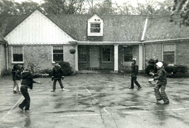 Students play a game of four square in front of the original school building of the Academy of Basic Education, today known as Brookfield Academy, in the mid-1960's. The building is today known as Founder's Hall, which houses the school's administration.