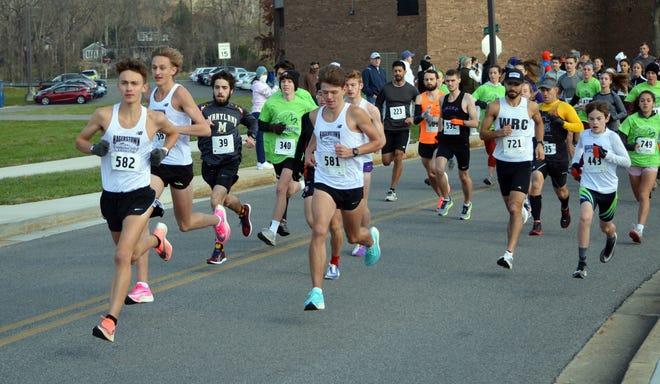 A field of more than 600 runners breaks from the start at the 21st annual Hagerstown Community College Turkey Trot 5K on Thursday morning. Iggy Chalker (582) was the overall champion in 14:33.