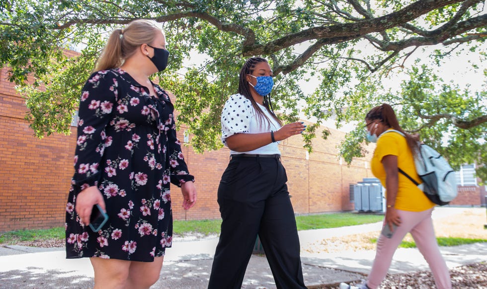 Southern Miss assistant teaching professor Dr. Jo Hawkins-Jones walks through the Southern Miss campus with her colleague, Karelia Pitts, the assistant to the dean for marketing and external relations, in Hattiesburg, Miss., on Thursday, Oct. 14, 2021.