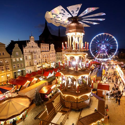People visit the illuminated Christmas Market in R