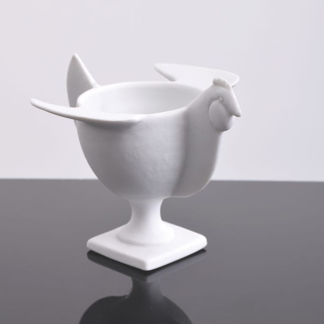 Francois-Xavier Lalanne often used animal motifs in his modern, minimalist sculptures. His porcelain eggcup with a chicken's head, wings and tail sold for $2,080 at Palm Beach Modern Auctions.