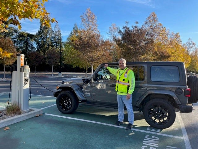 Fred Weaver, a general contractor, purchased a 2021 plug-in hybrid Jeep Wrangler and saw his commuter costs plummet. He is pictured at work on Thanksgiving Day, Nov. 25, 2021.