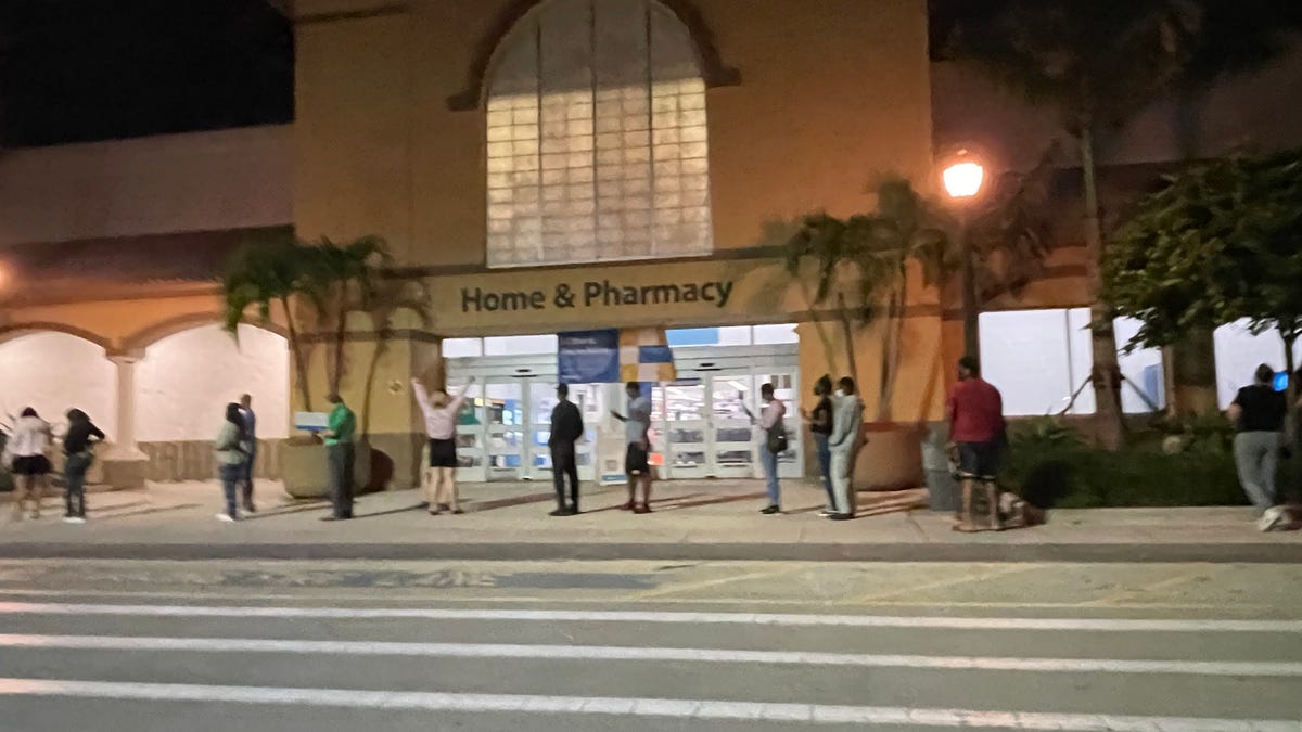 Shoppers lined up Friday waiting for a Coral Springs, Florida Walmart to open for Black Friday deals.