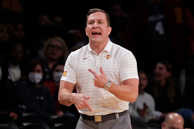 Iowa State coach T. J. Otzelberger directs the team against Memphis during the first half of an NCAA college basketball game in the NIT Season Tip-Off tournament Friday, Nov. 26, 2021, in Brooklyn, New York. Iowa State won 78-59.
