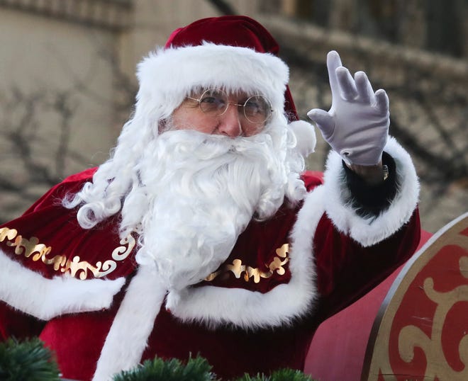 Santa Claus brings up the rear in his traditional spot concluding the 57th Annual Wilmington Jaycees Christmas Parade on Nov. 27. On that day, Delaware had 242 new COVID -19 cases. By Christmas Day, the figure skyrocketed to 1,554.