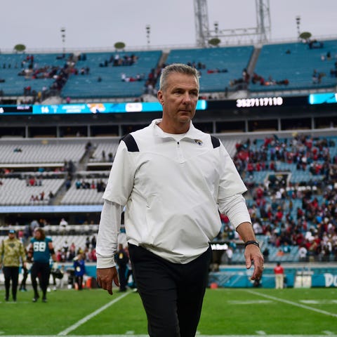 Jacksonville Jaguars head coach Urban Meyer walks 