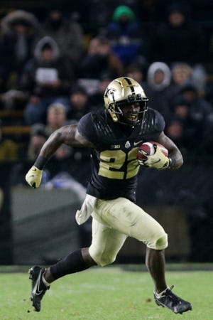 Purdue running back King Doerue (22) runs the ball during the third quarter of an NCAA college football game, Saturday, Nov. 27, 2021 at Ross-Ade Stadium in West Lafayette.